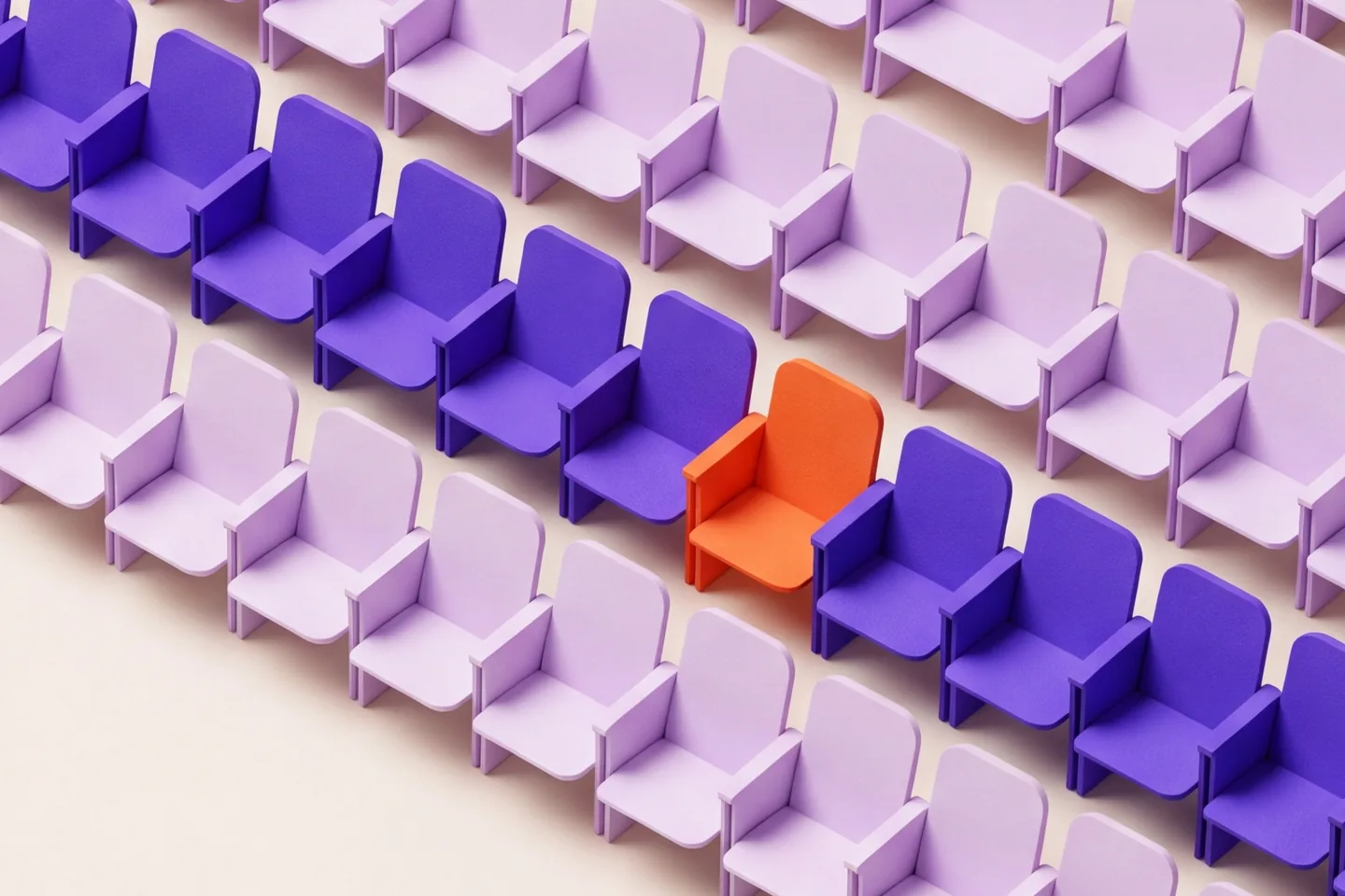 Rows of paper seats with one violet row and one mandarin seat
